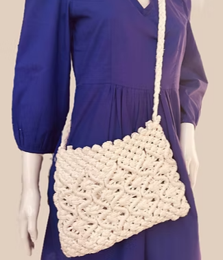 Blue dress with cream crossbody bag